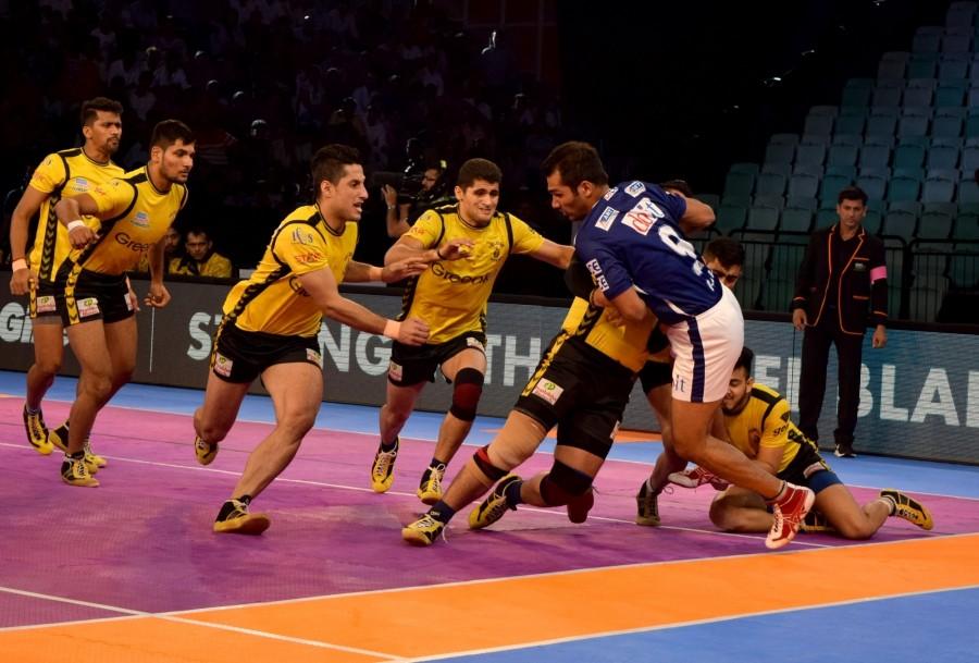 Telugu Titans scored an impressive 44-22 victory as they inflicted eighth consecutive defeat on Dabang Delhi in an inter zone clash of the Pro Kabaddi League (PKL) here on Thursday. It was Delhi's overall 13th defeat of their disappointing campaign. Rahul Chaudhri got all the plaudits as he ended up with 16 points for Telugu Titans. Pro Kabaddi League 2017,Telugu Titans crush Dabang Delhi,Telugu Titans beats Dabang Delhi,Telugu Titans,Dabang Delhi,Pro Kabaddi League
