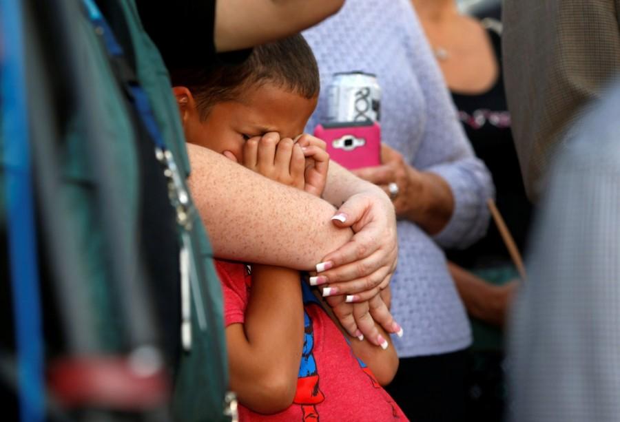 Alexander Wells, 9, attends a prayer vigil, in honor of those affected by the shooting on the Las Vegas Strip. Las Vegas,Mourning for Las Vegas,Las Vegas victims,Las Vegas shooting victims