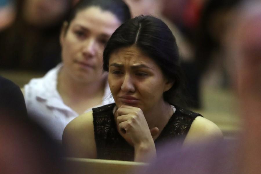 A woman mourns during an interfaith memorial service in Las Vegas. Las Vegas,Mourning for Las Vegas,Las Vegas victims,Las Vegas shooting victims