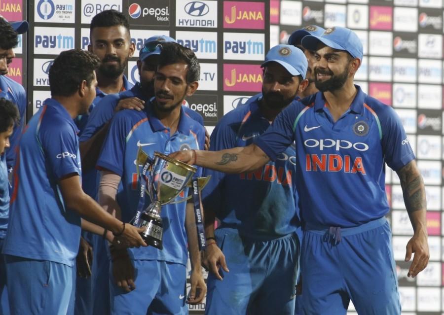 Sharma and fellow opener Ajinkya Rahane put on a 124-run partnership in 22.3 overs which virtually sealed the match in India's favour. Sharma plundered 125 runs off 109 balls with his innings featuring 11 impressive boundaries and five hits over the fence. This was his 14th century in the 50-over format. Sharma became the fastest Indian to reach the 2,000-run milestone in ODI cricket at home. He surpassed former India captain Sourav Ganguly and present incumbent Virat Kohli to the top spot. India thrash Australia,India beats Australia,India thrash Australia in 5th ODI,Rohit Sharma