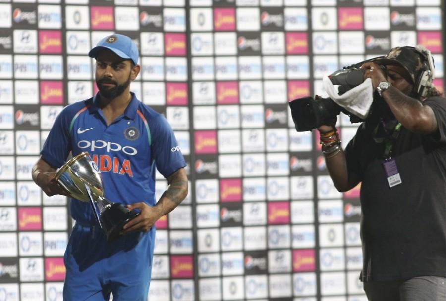 The right-hander from Mumbai achieved the feat in 42 innings while Ganguly took 45 and Kohli needed 46. Rahane, who has also been in good form in this series, played a steady knock of 61 runs off 74 balls which included seven boundaries. Fast bowler Nathan Coulter-Nile finally broke the partnership when he trapped Rahane leg-before. Kohli then joined Sharma in the middle and the duo proceeded to take the hosts slowly but surely towards victory, adding 99 runs between them off 16.4 overs. India thrash Australia,India beats Australia,India thrash Australia in 5th ODI,Rohit Sharma