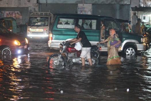 Heavy downpour, accompanied by thunderstorm for over three hours in the evening, inundated roads, bringing the traffic to a grinding halt during the peak hours. Officials said it was a cloudburst over the city as some areas recorded 7 cm to 12 cm rainfall. Two persons including a child were killed and two injured in a wall collapse in Singadikunta area in Banjara Hills. One person died of electrocution in Hussaini Alam in the old city.