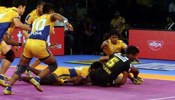 Players in action during a Pro Kabaddi League 2017 match between Tamil Thalaivas and Telugu Titans.