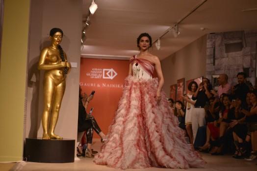 Actress Deepika Padukone looks gorgeous as she walks the ramp for Designer Gauri and Nainika in New Delhi.