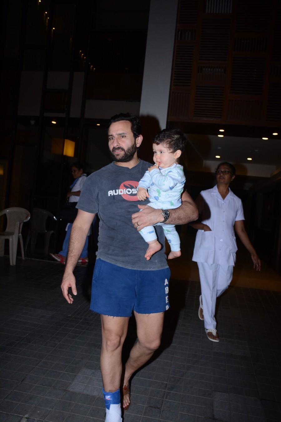Saif Ali Khan with his son Taimur Ali Khan at Soha Ali Khan's birthday bash.. Saif Ali Khan,Kareena Kapoor,Taimur Ali Khan,Taimur Ali Khan cute pics,Soha Ali Khan birthday bash,celebs at Soha Ali Khan birthday bash,Taimur Ali Khan at Soha Ali Khan birthday bash,Taimur Ali Khan at Soha birthday bash