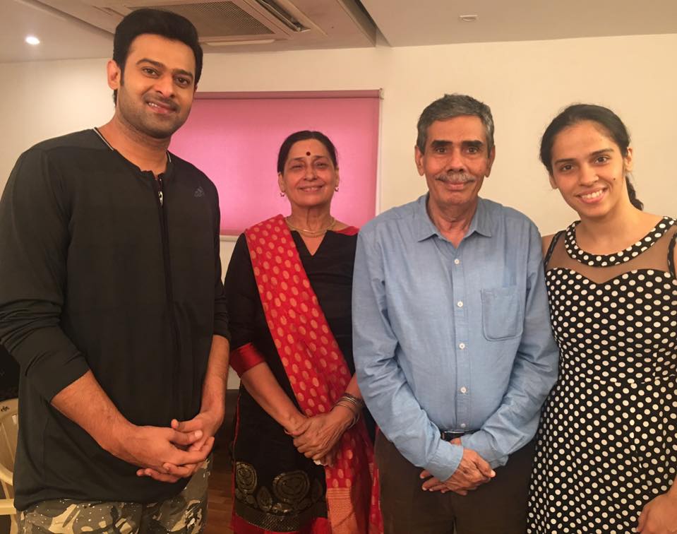 Indian Badminton Player Saina Nehwal along with her family with actor Prabhas on the sets of Saaho. Saina Nehwal,Badminton Player Saina Nehwal,Indian Badminton Player Saina Nehwal,Saina Nehwal meets Prabhas,actor Prabhas,Saaho,Saaho on the sets