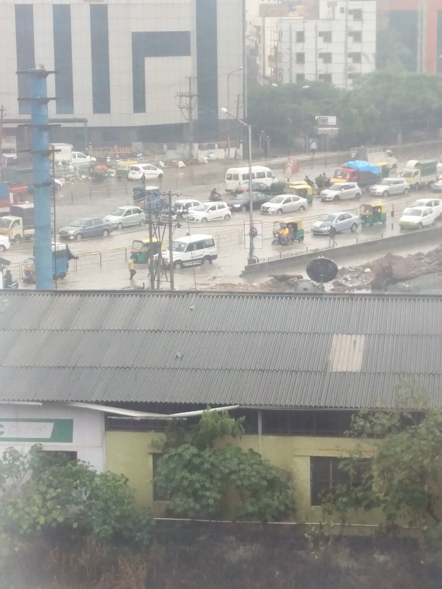 Rain wreaks havoc in Silk Board. Heavy rain,Heavy rain in Bengaluru,Bengaluru floods,Bangalore floods,bangalore floods roads,Heavy rain in Bangalore