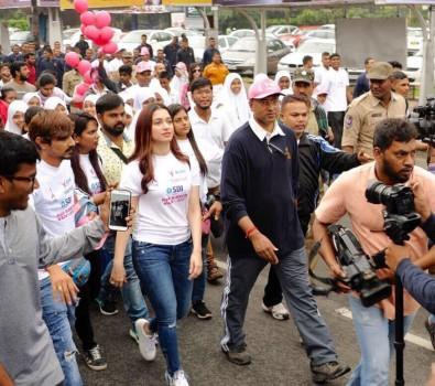 Actress Tamannaah Bhatia on Sunday participated in a walk organised here for breast cancer awareness. The actress along with Dharini, who fought breast cancer affecting both breasts at a young age of 24, flagged off the run in which about 3,000 people from various walks of life participated.