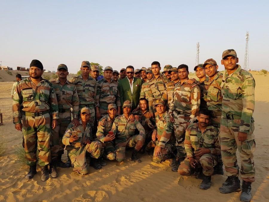 Sanjay, who is currently shooting for his next film "Saheb Biwi Aur Gangster 3" in Bikaner, Rajasthan, was photographed with them. "The real heroes of our country! Indian Army, proud Indian, Bikaner, shooting 'Saheb Biwi Aur Gangster 3'," Sanjay captioned the image that he tweeted on Sunday. Veteran actress Nafisa Ali will play Sanjay's mother in the third instalment of the crime drama franchise. Sanjay Dutt,actor Sanjay Dutt,real heroes,Indian army soldiers,Saheb Biwi Aur Gangster 3
