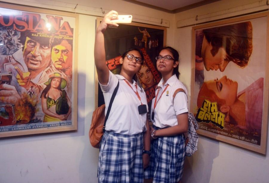 Students during an exhibition organsied on Amitabh Bachchan's 75th birthday in Kolkata. Amitabh Bachchan,actor Amitabh Bachchan,Amitabh Bachchan 75th birthday,Amitabh Bachchan 75th birthday Exhibition,Amitabh Bachchan 75th birthday celebration