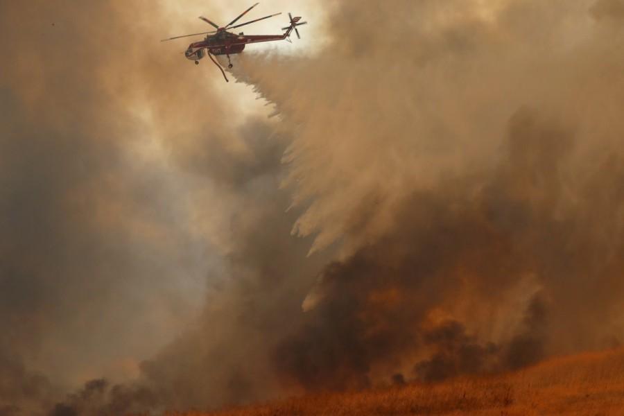 The toll from massive wildfires raging across California has increased to 23 with over 600 reported missing, police said. Sonoma county, one of the worst-hit areas, has alone reported of 285 missing persons, reports CNN. "I'm optimistic that we will get a lot of people connected," Sonoma county Sheriff Rob Giordano said on Wednesday night. California,California wildfire,California wildfire ravage,massive wildfire,California massive wildfire