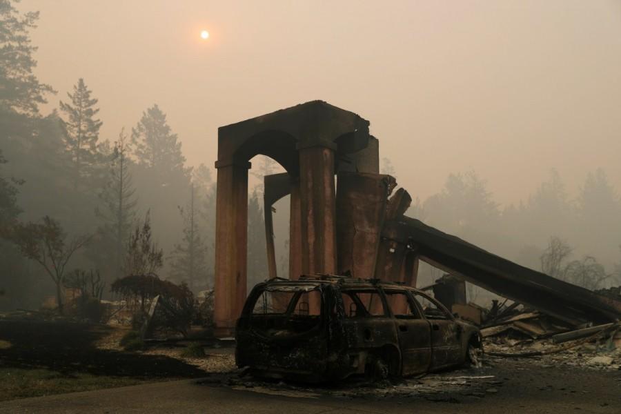 A destroyed home is seen at a residential neighborhood along Fountaingrove Parkway during the Tubbs Fire in Santa Rosa. California,California landscape,Tubbs Fire,Sonoma and Napa counties