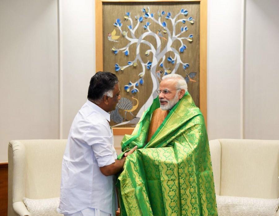 Tamil Nadu Deputy Chief Minister O. Panneerselvam on Thursday met Prime Minister Narendra Modi, triggering speculation of differences between him and Chief Minister K. Palaniswamy, but he asserted that they were working unitedly. "There are no hard feelings in me. And there will be no hard feelings because of me. It has been an unconditional merger (between the factions headed by Panneerselvam and Palaniswamy) at the end of the 'dharma yudham'," he said. Panneerselvam,O Panneerselvam,Panneerselvam meets Narendra Modi,Panneerselvam meets Modi,Narendra Modi,Palaniswamy,Edapadi Palaniswamy