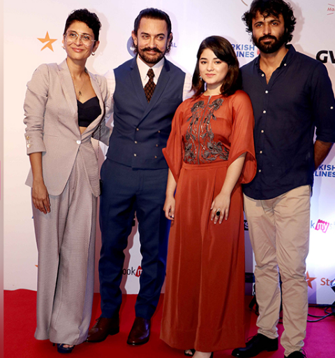 Aamir Khan who is busy in promoting his upcoming movie 'Secret Superstar' was spotted yesterday at a Film Festival in Mumbai. He was accompanied by his 'Secret Superstar' co-star Zaira Wasim at the red carpet. The Film Festival began yesterday where Aamir Khan came to support his wife Kiran Rao who is also the producer of 'Secret Superstar' Zaira Wasim also arrived with Aamir Khan. Aamir Khan made a stylish entry in formals, he wore a blue waistcoat and trousers with a white shirt pairing it up with a brown tie he looked absolutely dapper. Zaira Wasim wore a beautiful red attire and looked gorgeous. Kiran Rao kept it super stylish as always. The team glammed up the red carpet at the most awaited Film Festival of the year. The Superstar, Zaira Wasim along with Kiran Rao and the Director Advait Chandan posed together on the red carpet. Aamir Khan,actor Aamir Khan,Secret Superstar,Aamir Khan Secret Superstar,Film Festival in Mumbai,Film Festival