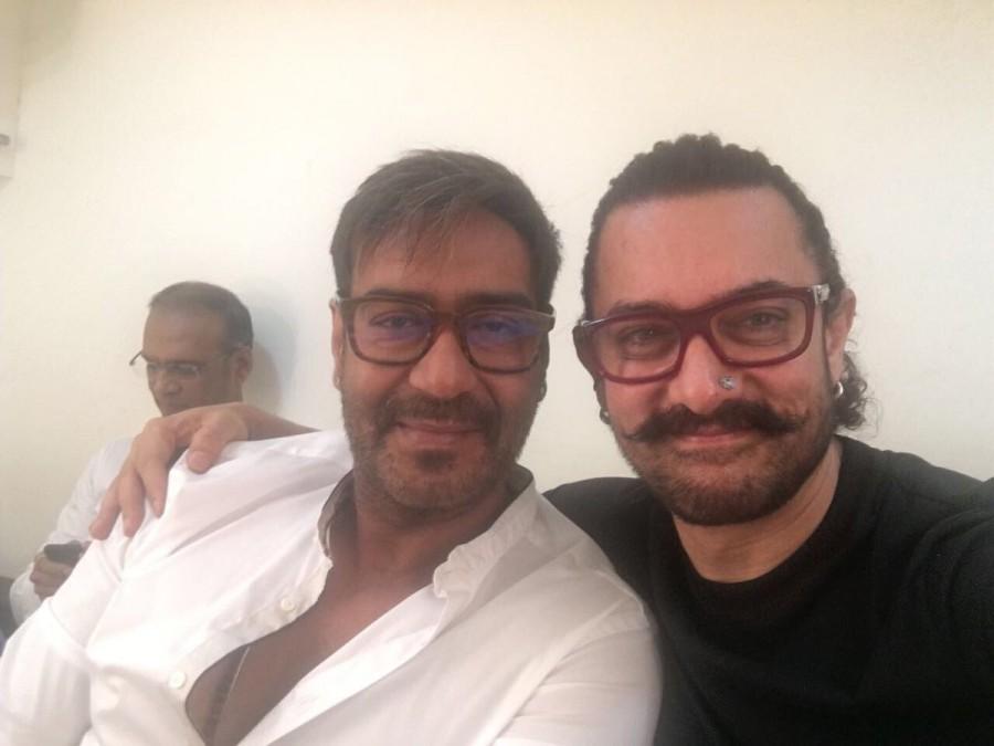 "Golmaal Again" and "Secret Superstar" are releasing around the festive occasion of Diwali, but there is no bad blood between Bollywood superstar Aamir Khan and actor Ajay Devgn. The "Dangal" star has praised Ajay by calling him a "great guy". Aamir took to Twitter on Saturday to share a photograph with Ajay. "Here's to ‘Golmaal'. Met Ajay after so long. What a great guy," Aamir tweeted. The two actors were seen together in the popular 1997 comedy-drama film "Ishq" along with Juhi Chawla and Kajol. Ajay wished good luck to Aamir's film "Secret Superstar", which will release on October 19. "Good guys always win... secret or not! Best of luck 'Secret Superstar'," wrote Ajay. Secret Superstar,Secret Superstar Aamir Khan,Aamir Khan,Golmaal Again actor Ajay Devgn,Golmaal Again,Ajay Devgn,Aamir Khan? meets Ajay Devgn