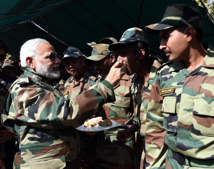 A day ahead of Modi's visit, Chief of Army Staff General Bipin Rawat had visited the area on Wednesday to review the security situation in the Kashmir valley. PM Narendra Modi,Narendra Modi,Narendra Modi celebrates Diwali,Modi celebrates Diwali,Narendra Modi celebrates Diwali with soldiers