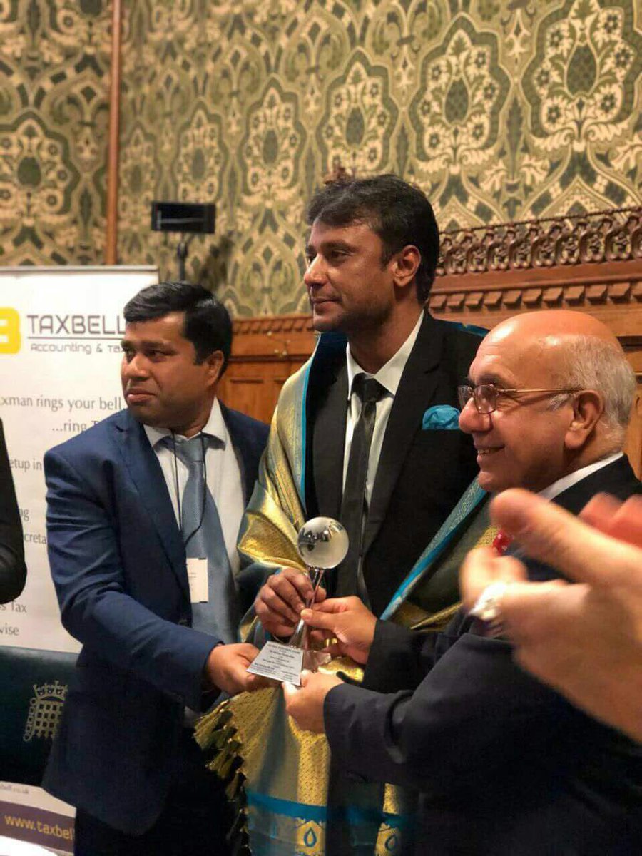South Indian actor Darshan recieves Award from British Parliament Challenging star Darshan,Darshan,Challenging star,Darshan at British Parliament,British Parliament