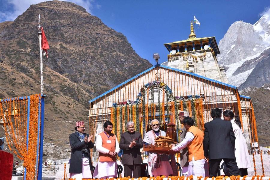 The Prime Minister sat in the sanctum sanctorum, offered prayers and performed the Rudrabhishek, a day after Diwali. He will be laying the foundation stone for a new 'Kedarpuri', which was ravaged in flash floods in 2013, killing thousands. Narendra Modi,Narendra Modi visits Kedarnath,Kedarnath,Prime Minister Narendra Modi,PM Narendra Modi