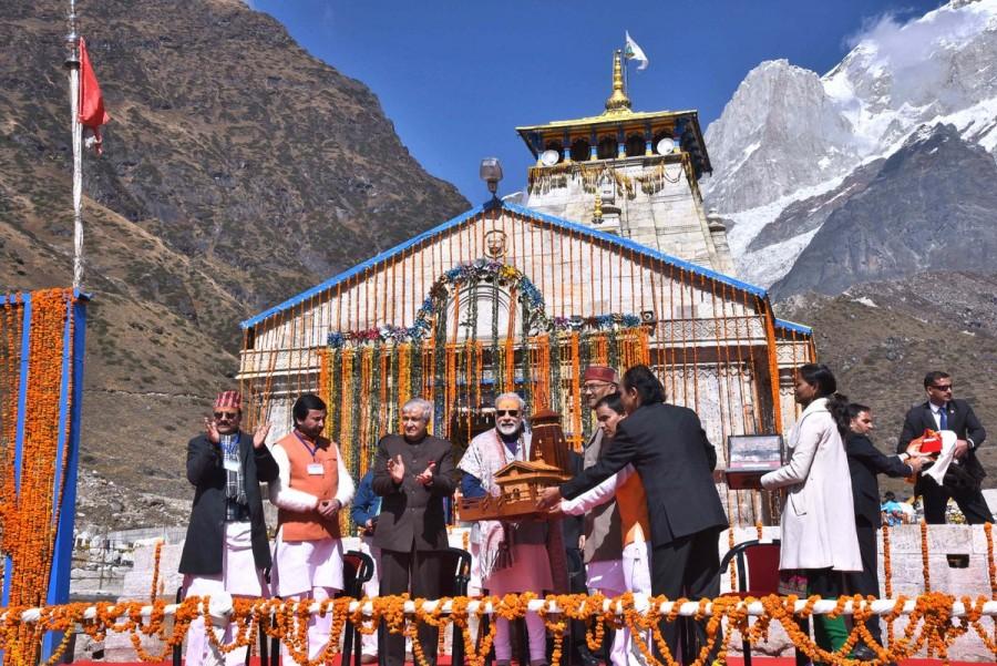 The area surrounding the temple was destroyed in June 2013 after the Chorabari Glacier lake breached following heavy rainfall that caused flash floods in the river Mandakini. Narendra Modi,Narendra Modi visits Kedarnath,Kedarnath,Prime Minister Narendra Modi,PM Narendra Modi