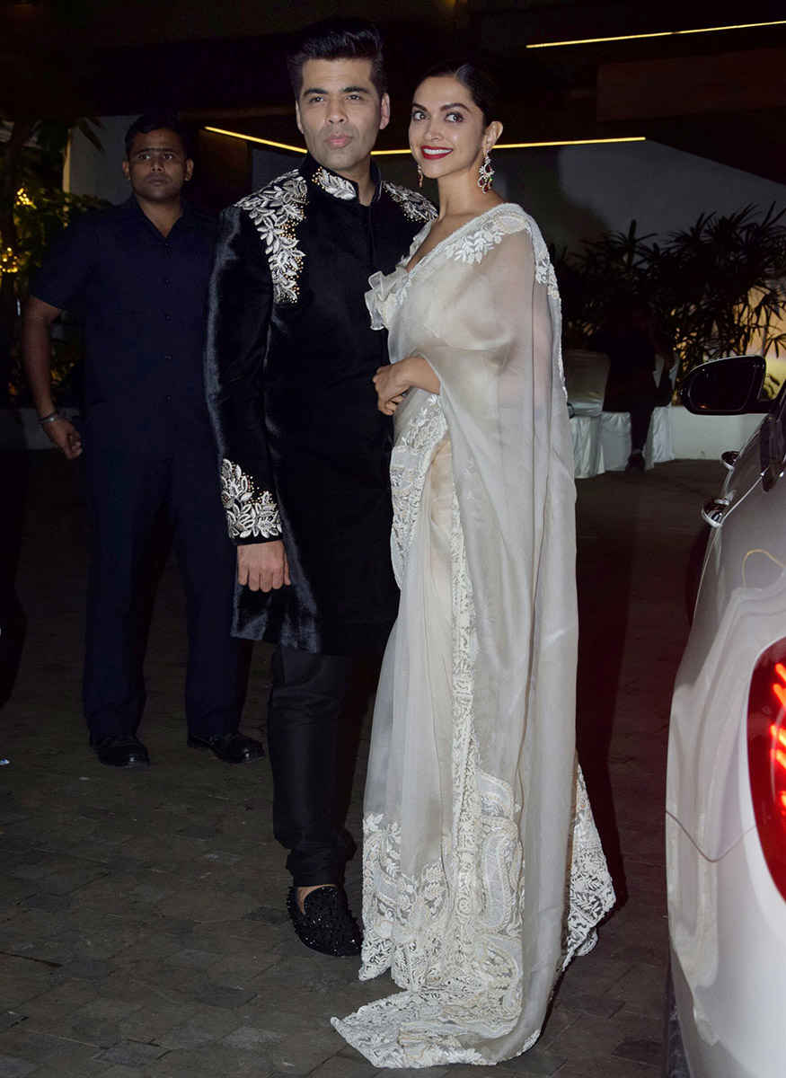 Karan Johar and Deepika Padukone spooted at Aamir Khan's Diwali Party. Shah Rukh Khan,Alia Bhatt,Deepika Padukone,Kareena Kapoor Khan,Aamir Khan's Diwali Party,Aamir Khan Diwali Party,Aamir Khan Diwali Party pics,Aamir Khan Diwali Party images,Aamir Khan Diwali Party stills,Aamir Khan Diwali Party pictures