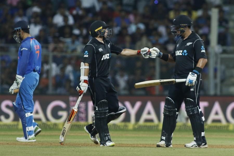 Unperturbed by the dismissals, Kohli and Karthik stood firm, punishing the loose deliveries to build a patient partnership of 73 runs for the fourth wicket. However, the partnership was brought to an end by Southee's short-pitched delivery which found the leading edge of Karthik's bat, offering an easy catch to Colin Munro at fine leg. Later, Kohli continued to lead the side with Mahendra Singh Dhoni (25) adding 63 runs for the fifth wicket which helped the side cross the 200-run mark. Dhoni, who started well failed to continue his innings, after he was caught off a short length delivery by Boult. Later, incoming batsman Hardik Pandya (16) and tailender Bhuvneshwar Kumar (26) played useful cameo knocks with Kohli. Tom Latham,Ross Taylor,Tom Latham and Ross Taylor,india vs new zealand,new zealand beats india,new zealand trash india,Virat Kohli,Virat Kohli 100