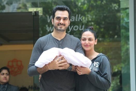 Actress Esha Deol comes out along with her husband Bharat Takhtani after being released from a Mumbai hospital after she gave birth to a baby girl on Oct 23, 2017.