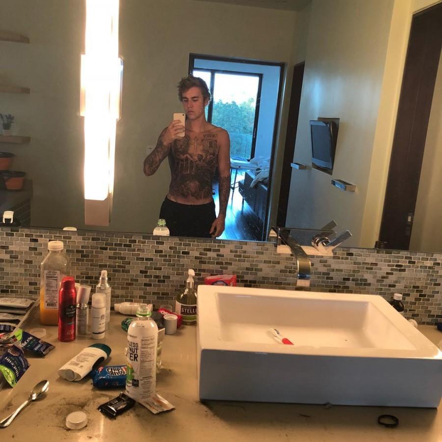 Bieber, 23, showed off his torso with massive tattoos on Instagram. It shows gargoyles, skeletons and archways on his chest and stomach, reports aceshowbiz.com. The new tattoos are the latest additions to his torso tattoo collection that includes a head of lion, bear, gothic cross and his mother's birthday in roman numerals. The new ones completely cover up his previous body art that read "Purpose" as a tribute to his fourth studio album. A huge "Son of God" inked across his abs and first revealed on stage during his concert in Italy in 2016 is also no longer visible. Justin Bieber,Justin Bieber new Tattoo,Justin Bieber Huge Torso Tattoo,Justin Bieber Tattoo,Justin Bieber tattoos,Justin Bieber Tattoo pics,Justin Bieber Tattoo images,Justin Bieber Tattoo stills,Justin Bieber Tattoo pictures,Justin Bieber Tattoo photos