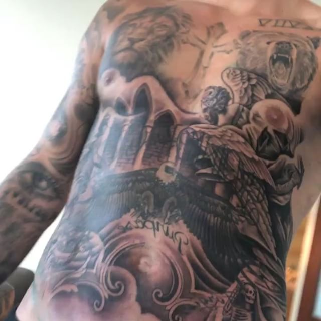 Bieber got his first tattoo on his 16th birthday. It was that of a small bird from one of his favourite children's books and was inked on his left hip. The "Sorry" hitmaker also got a tattoo of his former on-and-off girlfriend Selena Gomez. The former Disney actress was depicted as an angel on his left forearm. Now that they split for good, he plans to get rid of it. "This is my ex-girlfriend. I kind of tried to cover her face up with some shading, but people still know," he had said in a past interview. Justin Bieber,Justin Bieber new Tattoo,Justin Bieber Huge Torso Tattoo,Justin Bieber Tattoo,Justin Bieber tattoos,Justin Bieber Tattoo pics,Justin Bieber Tattoo images,Justin Bieber Tattoo stills,Justin Bieber Tattoo pictures,Justin Bieber Tattoo photos