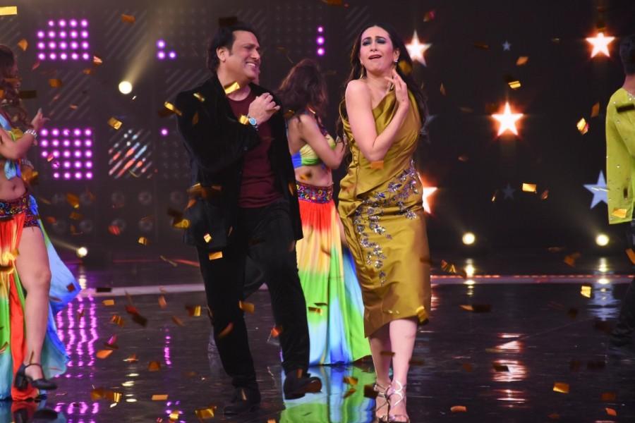 Govinda and Karisma Kapoor on the sets of "Dance Champions" show in Mumbai. Govinda and Karisma Kapoor,Govinda,Karisma Kapoor,Govinda on Dance Champions,Karisma Kapoor at Dance Champions