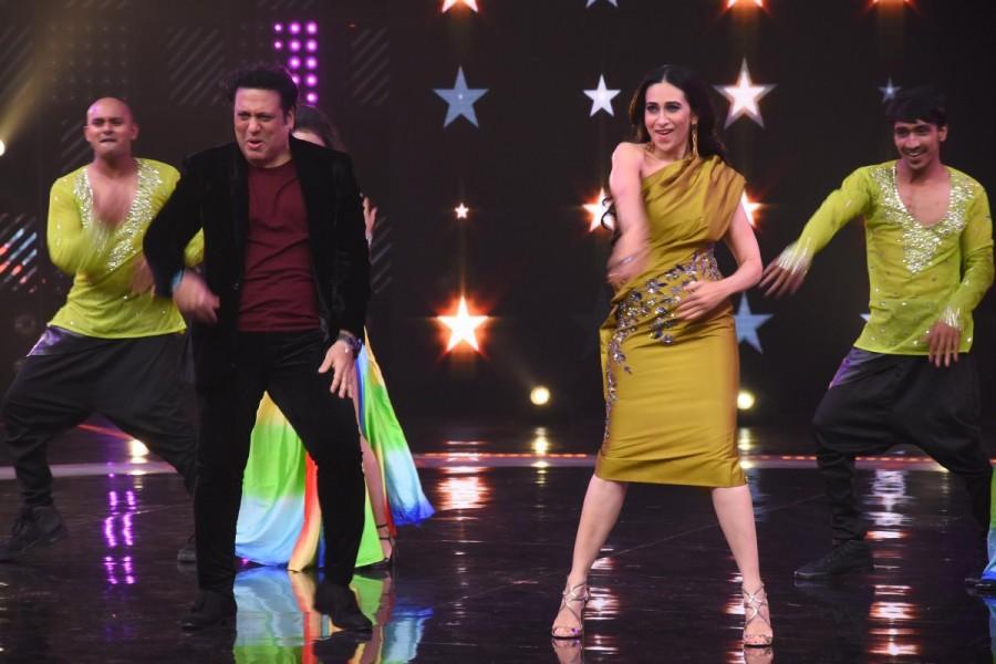 Actors Govinda and Karisma Kapoor on the sets of "Dance Champions" show in Mumbai. Govinda and Karisma Kapoor,Govinda,Karisma Kapoor,Govinda on Dance Champions,Karisma Kapoor at Dance Champions