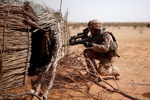 A French soldier of the 13th engineering regiment controls a touareg home near Tin Hama, Mali.