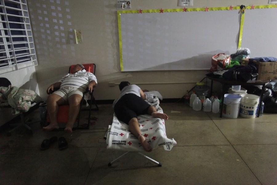 A man and a woman who lost their home sleep at a school turned shelter in Toa Baja. Puerto Rico,Hurricane Maria,Puerto Rico after Hurricane Maria