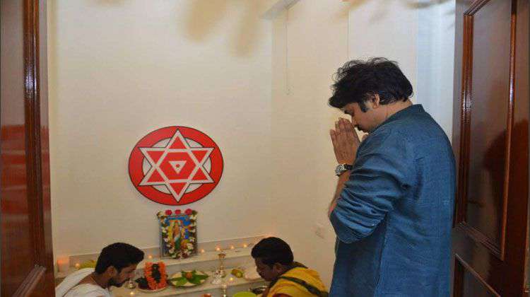 Actor Pawan Kalyan offers his prayer during Jana Sena Party's office inauguration. Pawan Kalyan,actor Pawan Kalyan,Pawan Kalyan Jana Sena Party,Jana Sena Party,Jana Sena Party office,Jana Sena Party office inaugurated,Jana Sena Party office pics,Jana Sena Party office images,Jana Sena Party office stills,Jana Sena Party office pictures
