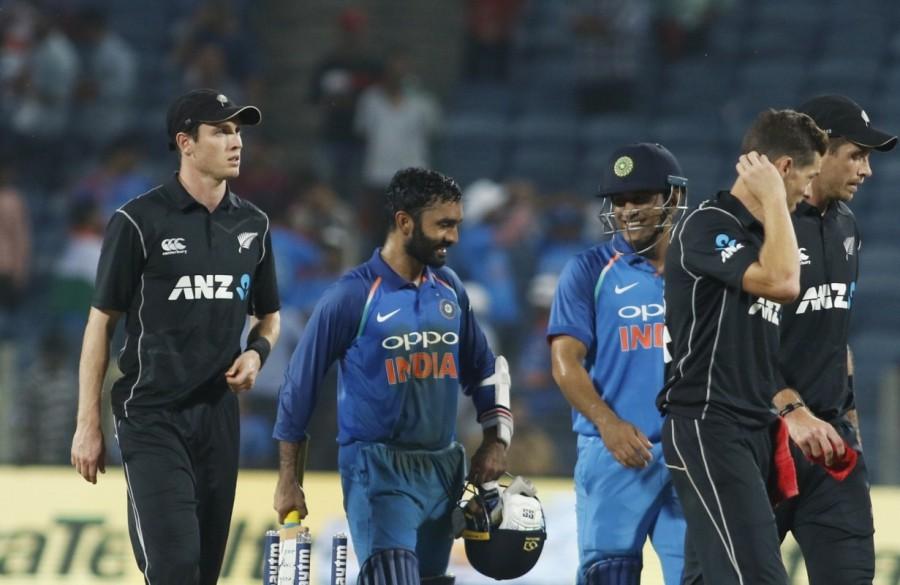 A good batting display helped India beat New Zealand by six wickets in the second One Day International at the Maharashtra Cricket Association Stadium here on Wednesday. With this result, India equalised the three match ODI series. In the first match, India were defeated by the visitors by six wickets in Mumbai. India's Shikhar Dhawan (68), Dinesh Karthik (64 not out) scored handsomely for the cause. It was a bad start for India as opener Rohit Sharma (7) departed with just 22 runs on the board. The right-hand batsman was dismissed by pacer Tim Southee in the fifth over. But Dhawan and skipper Virat Kohli (29) then forged a 58-run second wicket partnership before in-form Kohli was dismissed by Colin de Grandhomme in the 14th over. Kohli slammed three fours and one six in his 29 ball innings. Shikhar Dhawan,Dinesh Karthik,India beat New Zealand,India beat New Zealand by six wickets,Virat Kohli