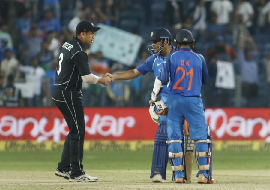 Skipper Kane Williamson (3) also failed this time as he was adjudged leg before wicket off pacer Jasprit Bumrah in the sixth over. After adding two more runs, Munro was also bowled by Bhuvneshwar in the seventh over with the scoreboard reading 27/3. Previous match stars Ross Taylor (21) and Tom Latham (38), then came into the middle. But just when things seemed good in the middle, Taylor was dismissed by Hardik Pandya in the 16th over. With top order back in the hut, it was now up to the middle-order batsmen. Latham and Henry Nicholls added 60 runs for the fifth wicket before Latham was sent packing by spinner Axar Patel. Unperturbed by the fall of Latham's wicket, Nicholls and Grandhomme stabilised the New Zealand innings as they forged 47 runs to help their team cross the 160-run mark. Pacer Bhuvneshwar once again came into play as the pacer dismissed Nicholls when the scoreboard was reading 188. Shikhar Dhawan,Dinesh Karthik,India beat New Zealand,India beat New Zealand by six wickets,Virat Kohli