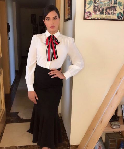 This is our personal favorites, she is wearing a blouse with a bow tie by Kate Spade and skirt by Marks and Spencer India. Richa Chadha,actress Richa Chadha,Jia aur Jia promotion,Jia aur Jia movie promotion,Jia aur Jia promotion pics,Jia aur Jia promotion images,Jia aur Jia promotion stills