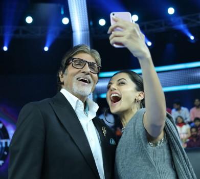Actress Taapsee Pannu says she is addicted to sharing screen space with megastar Amitabh Bachchan. She once again shared screen space with Big B in his game show 