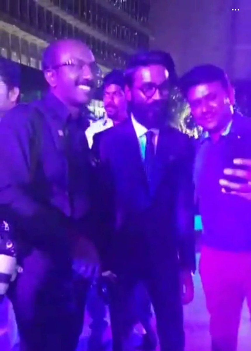 Actor Dhanush spotted at 2.0 audio launch. Dhanush,Rana Daggubati,RJ Balaji,2.0 audio launch,2.0 music launch