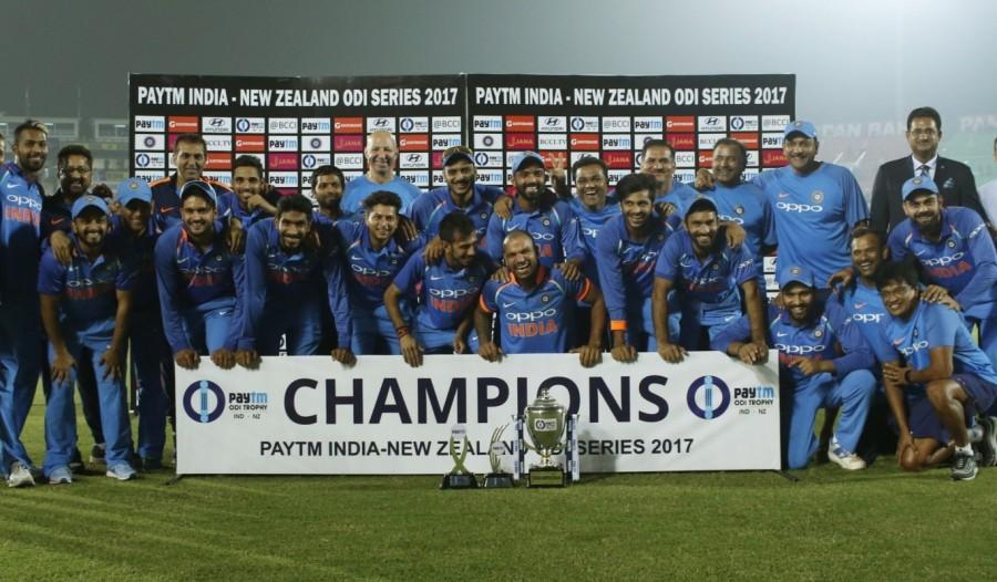 Chasing a daunting target of 338 runs, the Kiwis could only manage 331/7 in their allotted 50 overs. Colin Munro (75), skipper Kane Williamson (64) and Tom Latham (65) were the major contributors for New Zealand. For India, pacer Jasprit Bumrah scalped three wickets and leg-spinner Yuzvendra Chahal took two. India have clinched the three-match ODI series 2-1. The visitors had won the series opener in Mumbai by six wickets before the Indians won the second match by the same margin in Pune to draw level. India captain Virat Kohli was declared the man of the series for scoring 263 runs in the three matches. He has notched up two centuries in this series. This was the first day-night match at this venue. The Kiwis were off to a flying start with openers Martin Guptill and Munro going after the Indian bowlers. India beat New Zealand,India vs New Zealand,India New Zealand,India beat New Zealand 3rd ODI,Virat Kohli,Jasprit Bumrah,Rohit and Kohli,Rohit Sharma