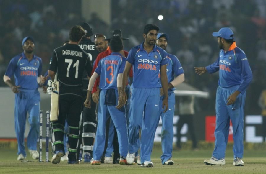 Latham was run out following a horrible mix-up with Colin de Grandhomme in the very next over while Bumrah accounted for Mitchell Santner with two balls remaining. With the Kiwis needing 11 runs to win off the last ball, a desperate slog by Tim Southee only earned a boundary at the mid-wicket fence as the Indians celebrated. Earlier, brilliant performances from opener Rohit Sharma and Kohli helped India post a daunting 337/6 after being asked to bat first. Rohit was the top scorer for India with 147 runs while Kohli slammed 113 to cross the milestone of 9,000 ODI runs. Rohit struck his 15th century in ODIs, the fifth of this year and the first against New Zealand. Kohli slammed his 32nd ton and the fifth against the visitors to help India score the highest total in 15 ODIs here. The previous was 303 by South Africa against India in 2015. It was also Kohli's sixth century in 2017, the most by a captain in a year, beating five by Sourav Ganguly (2000), Australia's Ricky Ponting (2003, 2007), South Africa's Graeme Smith (2005) and AB de Villiers (2015). While Rohit and Kohli helped India to cross the 250-run mark comfortably, after the former's departure, the middle-order batsmen failed to perform. In the last 10 overs, India scored only 85, a credit to the visitors who got their death bowling spot on. India beat New Zealand,India vs New Zealand,India New Zealand,India beat New Zealand 3rd ODI,Virat Kohli,Jasprit Bumrah,Rohit and Kohli,Rohit Sharma