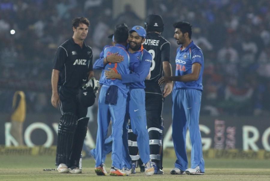 It was a steady start for India as both openers Shikhar Dhawan (14) and Rohit put on 29 runs with some brilliant strokes before Dhawan was dismissed by Southee in the seventh over. It turned out to be the only success for the visitors for a long time as Rohit and incoming batsman Kohli applied themselves perfectly in the middle to frustrate the bowlers till the 42nd over. The duo forged a 230-run partnership, the highest stand between the two, going past the 219 set against Sri Lanka earlier this year. But just when things seemed perfect, Rohit was dismissed by Mitchell Santner, caught by Southee, while trying to pace up the innings. His 138-ball knock was laced with 18 boundaries and two sixes. "Felt really good to spend some time out in the middle. Having missed out in the previous two games, I wanted to make it count," Rohit said later. New batsman Hardik Pandya, who was promoted up the order, joined Kohli but scored just eight runs in six balls. India beat New Zealand,India vs New Zealand,India New Zealand,India beat New Zealand 3rd ODI,Virat Kohli,Jasprit Bumrah,Rohit and Kohli,Rohit Sharma