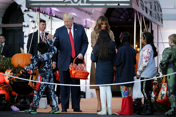 U.S. President Donald Trump and first lady Melania Trump host Halloween at the White House on the South Lawn October 30, 2017 in Washington, DC. The first couple gave cookies away to costumed trick-or-treaters one day before the Halloween holiday. Donald Trump and Melania Trump,Donald Trump,Melania Trump,Halloween,Halloween 2017,Donald Trump celbrates Halloween,Melania Trump celbrates Halloween