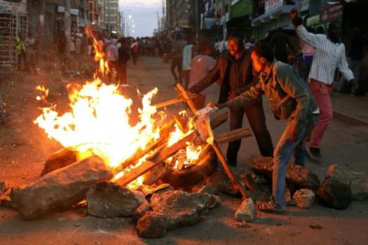 Opposition supporters set barricades on fire during a protest in the slum area of Mathare in the capital Nairobi on 30 Oct. 2017.