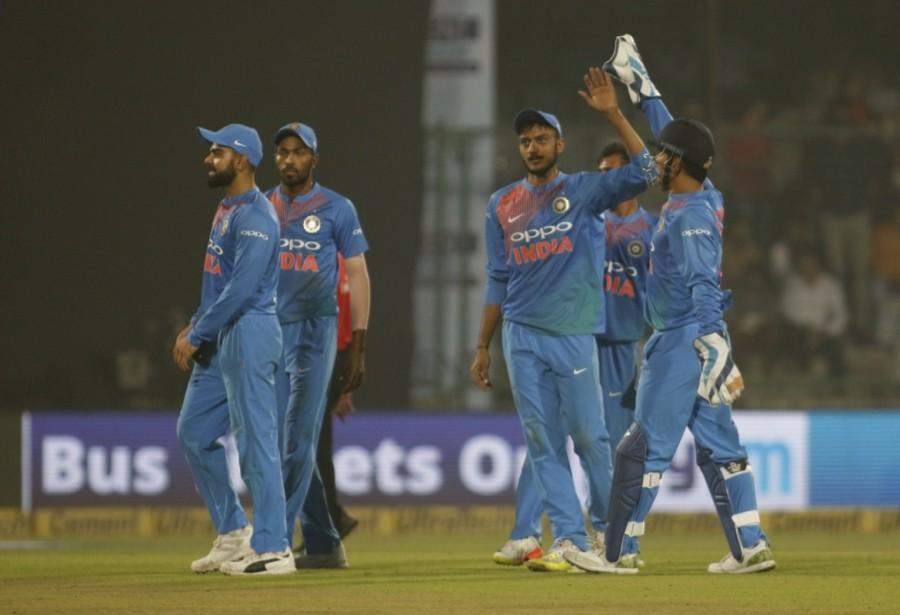 Williamson, who started off by clobbering Bhuvneshwar for a six before enjoying a reprieve from Kohli at mid-off off Nehra, fell prey to Pandya's first delivery of the match, comfortably caught behind by Mahendra Singh Dhoni. The dismissal of Williamson brought in Tom Bruce (10 from 10b), who started off with a boundary off Pandya but fell immediately to left-arm spinner Axar Patel. One ball later, Axar dismissed Colin de Grandhomme (0) as the Kiwis found themselves tottering at a precarious 84/5 after 13 overs. They were soon reduced to 99/7 as the Indian bowlers tightened the noose. India thrash New Zealand,India beats New Zealand,Ashish Nehra,ashish nehra farewell,ashish nehra retirement match,Ashish Nehra retirement
