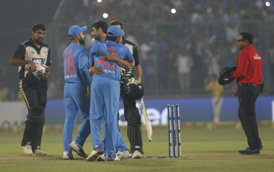 Chahal dealt the final nail on the coffin by dismissing New Zealand's last hope -- Latham, smartly stumped by Dhoni as the asking rate kept on mounting. Merely a formality with the Kiwis requiring 61 off the last over, Kohli threw the ball to Nehra for one last time in his 18-year-old international career. As Nehra went back to his run-up to bowl his fourth of the over, a young ball boy took everyone by surprise when he came up running to touch the veteran pacer's feet. Earlier, India made full use of the horrible fielding effort from the Kiwis to decimate the Kiwi bowlers. India thrash New Zealand,India beats New Zealand,Ashish Nehra,ashish nehra farewell,ashish nehra retirement match,Ashish Nehra retirement