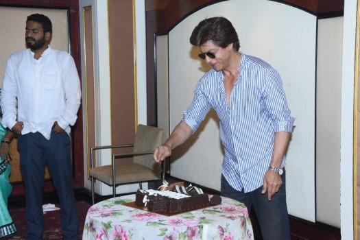 Shah Rukh Khan poses for the shutterbugs during his birthday celebration in Alibaug.