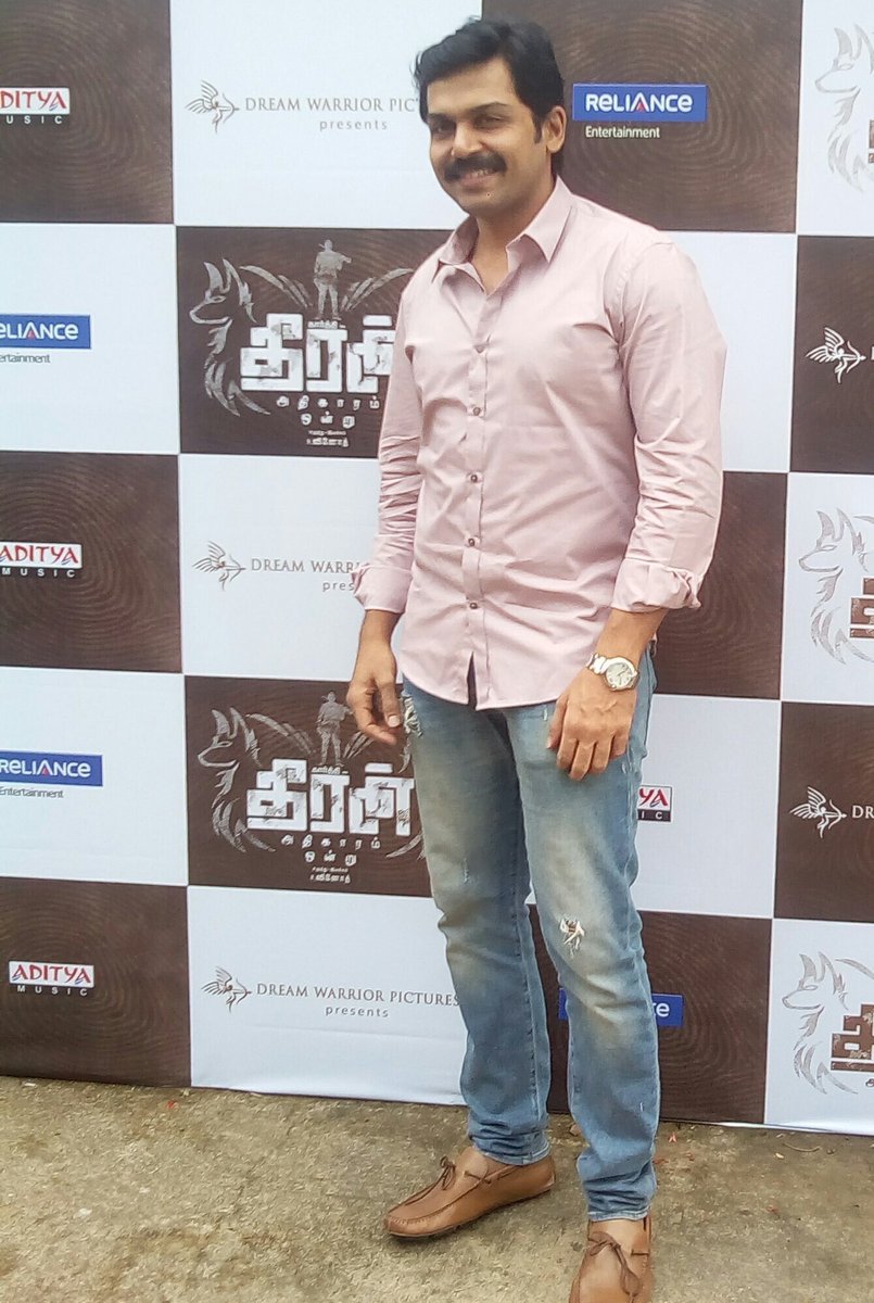 Karthi poses for the shutterbugs during Theeran Adhigaram Ondru audio launch. Karthi,Rakul Preet Singh,Ghibran,Theeran Adhigaram Ondru,Theeran Adhigaram Ondru audio launch,Theeran Adhigaram Ondru audio launch pics,Theeran Adhigaram Ondru audio launch images,Theeran Adhigaram Ondru audio launch stills,Theeran Adhigaram Ondru audio l