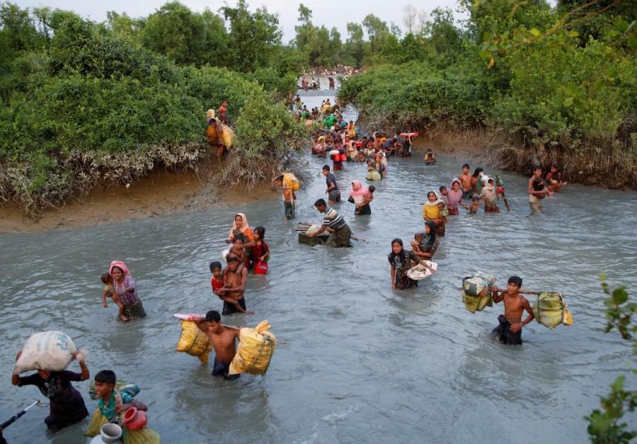 Rohingya refugees,Rohingya refugees fleeing,Naf river,Bangladesh-Myanmar border,Rohingya refugees crossing Naf river,bangladesh-myanmar border
