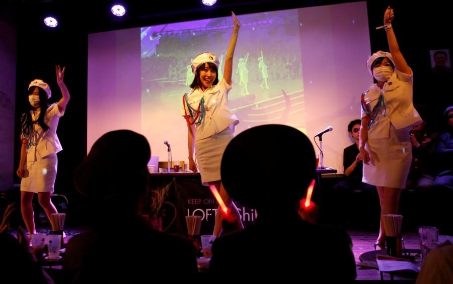 Chunhun (C) and other members perform a Moranbong Band dance. North Korea fan club,North Korea,North Korea fan club in Tokyo