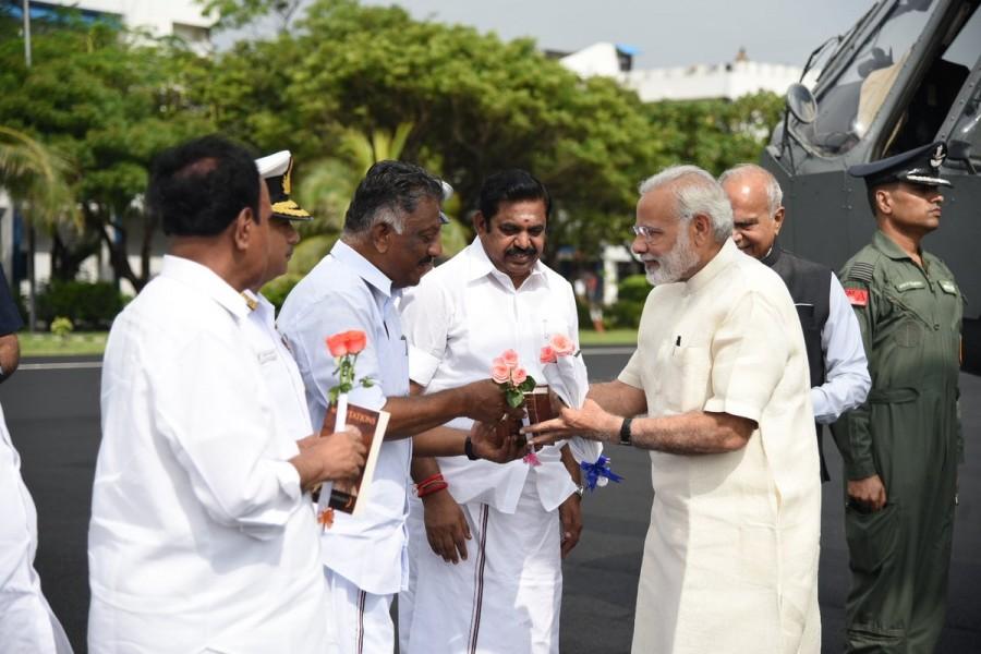 O. Panneerselvam welcomes PM Narendra Modi on his arrival at Chennai. Narendra Modi,Narendra Modi in Chennai,CM Edappadi K Palaniswami,O. Panneerselvam,TN Guv Banwarilal Purohit,PM Narendra Modi